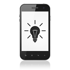 Image showing Finance concept: Light Bulb on smartphone