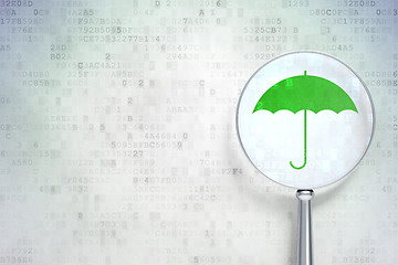 Image showing Safety concept:  Umbrella with optical glass on digital