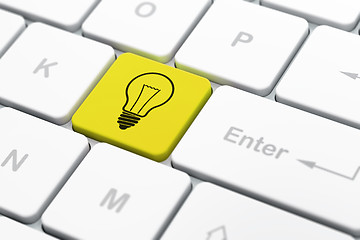 Image showing Finance concept: Light Bulb on computer keyboard background