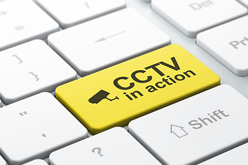 Image showing Security concept: Cctv Camera and CCTV In action on keyboard