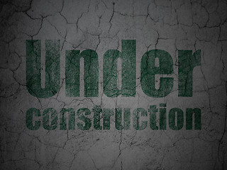 Image showing Web design concept: Under Construction on grunge wall background