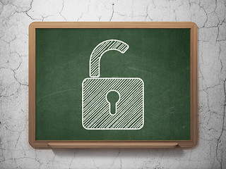 Image showing Security concept: Opened Padlock on chalkboard background