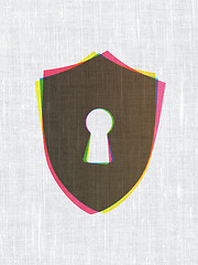 Image showing Safety concept: Shield With Keyhole on fabric texture background