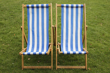 Image showing stripped empty deckchairs