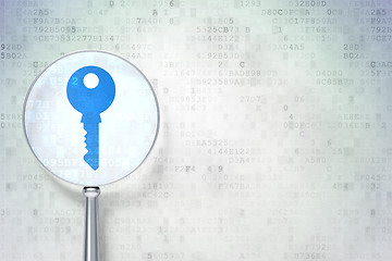 Image showing Security concept:  Key with optical glass on digital background