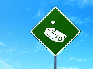 Image showing Safety concept: Cctv Camera on road sign background