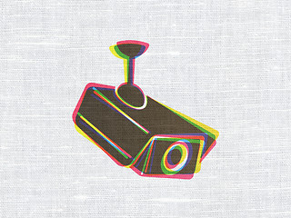 Image showing Protection concept: Cctv Camera on fabric texture background