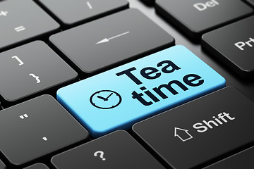 Image showing Timeline concept: Clock and Tea Time on computer keyboard