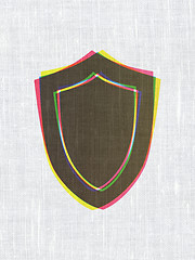 Image showing Protection concept: Shield on fabric texture background