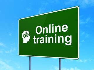 Image showing Education concept: Online Training and Head Gears on road sign