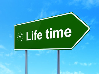 Image showing Life Time and Clock on road sign background