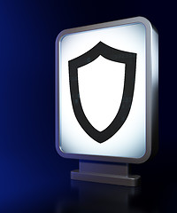 Image showing Security concept: Contoured Shield on billboard background