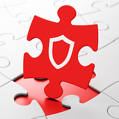 Image showing Security concept: Contoured Shield on puzzle background