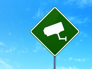 Image showing Privacy concept: Cctv Camera on road sign background