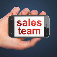 Image showing Marketing concept: Sales Team on smartphone