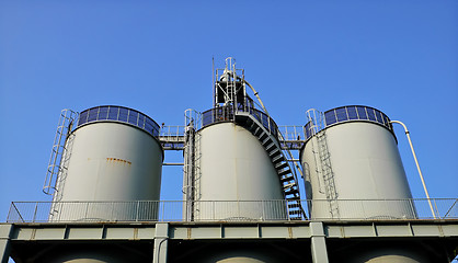 Image showing huge industrial reservoir barrels