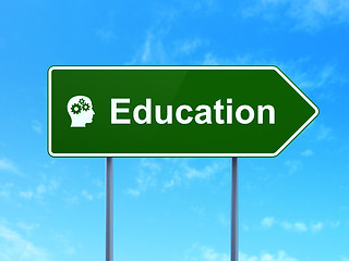 Image showing Education and Head With Gears on road sign