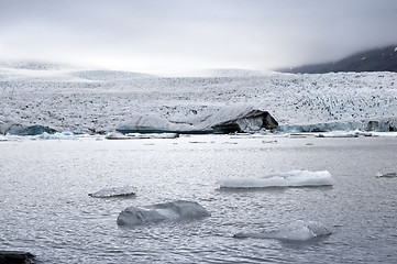 Image showing Mountain, iceberg and lagoon. Iceland