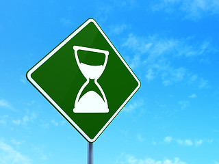 Image showing Timeline concept: Hourglass on road sign background