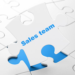 Image showing Marketing concept: Sales Team on puzzle background