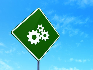 Image showing Business concept: Gears on road sign background