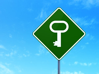 Image showing Security concept: Key on road sign background