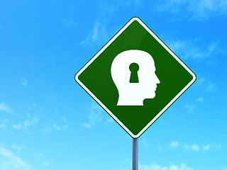 Image showing Advertising concept: Head With Keyhole on road sign background