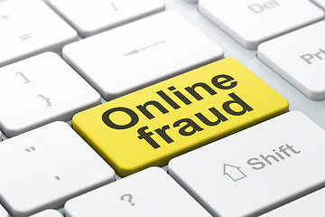 Image showing Privacy concept: Online Fraud on computer keyboard background