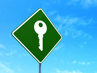 Image showing Security concept: Key on road sign background