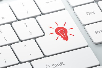 Image showing Finance concept: Light Bulb on computer keyboard background