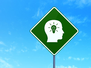 Image showing Marketing concept: Head With Light Bulb on road sign background