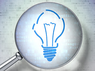 Image showing Business concept:  Light Bulb with optical glass on digital