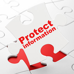 Image showing Protection concept: Protect Information on puzzle background