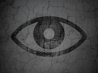 Image showing Protection concept: Eye on grunge wall background