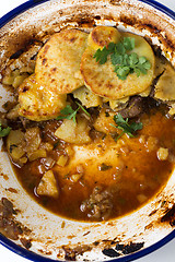 Image showing Tagine bowl leftover beef and potato