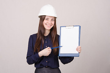 Image showing Girl in a helmet advertises inscription