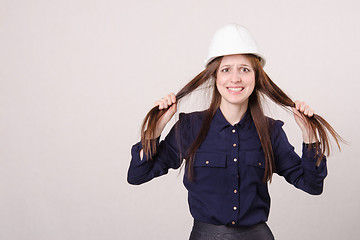 Image showing Young girl in shock tearing my hair out