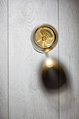 Image showing Glass of white wine on wooden table