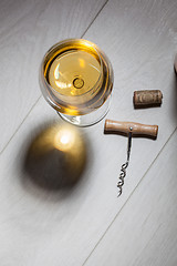 Image showing Glass of white wine on wooden table