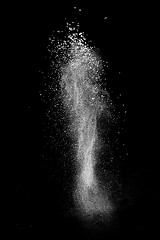 Image showing White powder explosion isolated on black