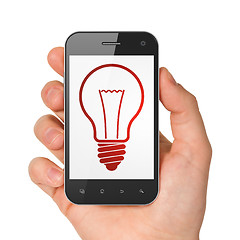 Image showing Finance concept: Light Bulb on smartphone