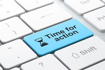 Image showing Time concept: Hourglass and Time for Action on computer keyboard