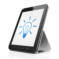 Image showing Finance concept: Light Bulb on tablet pc computer