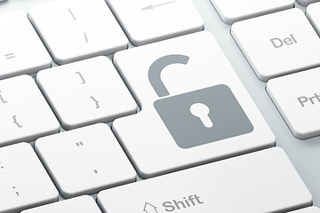 Image showing Safety concept: Opened Padlock on computer keyboard background