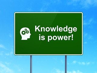 Image showing Education concept: Knowledge Is power! and Head road sign