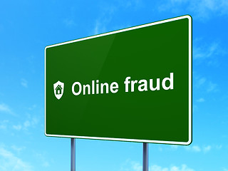 Image showing Protection concept: Online Fraud and Shield on road sign