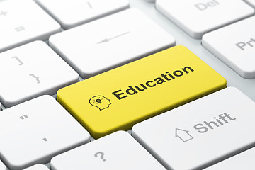 Image showing Education concept: Head With Lightbulb and Education on computer