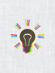 Image showing Finance concept: Light Bulb on fabric texture background