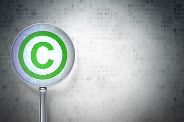 Image showing Law concept:  Copyright with optical glass on digital background