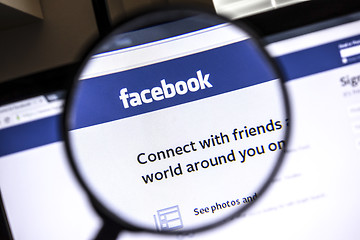 Image showing Facebook website under a magnifying glass